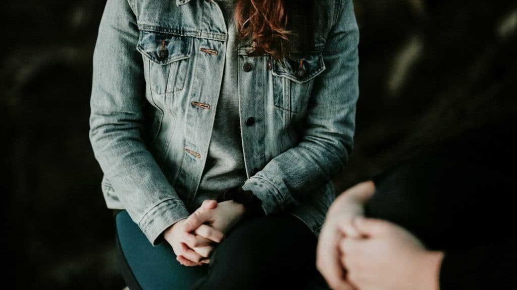 woman wearing gray jacket