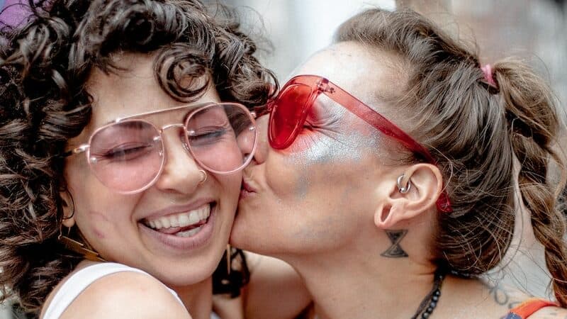 women in white sleeveless top